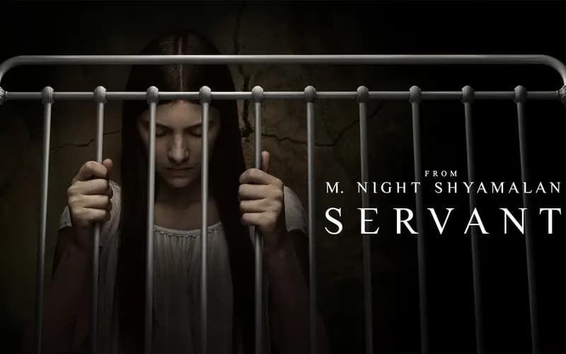 Young woman with long hair, head bowed, gripping the rails of a crib, beside the title text for the series 'Servant'