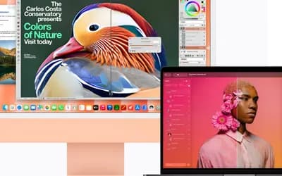 Orange iMac and MacBook screens showing photo editing apps with a colorful duck poster and a floral portrait.