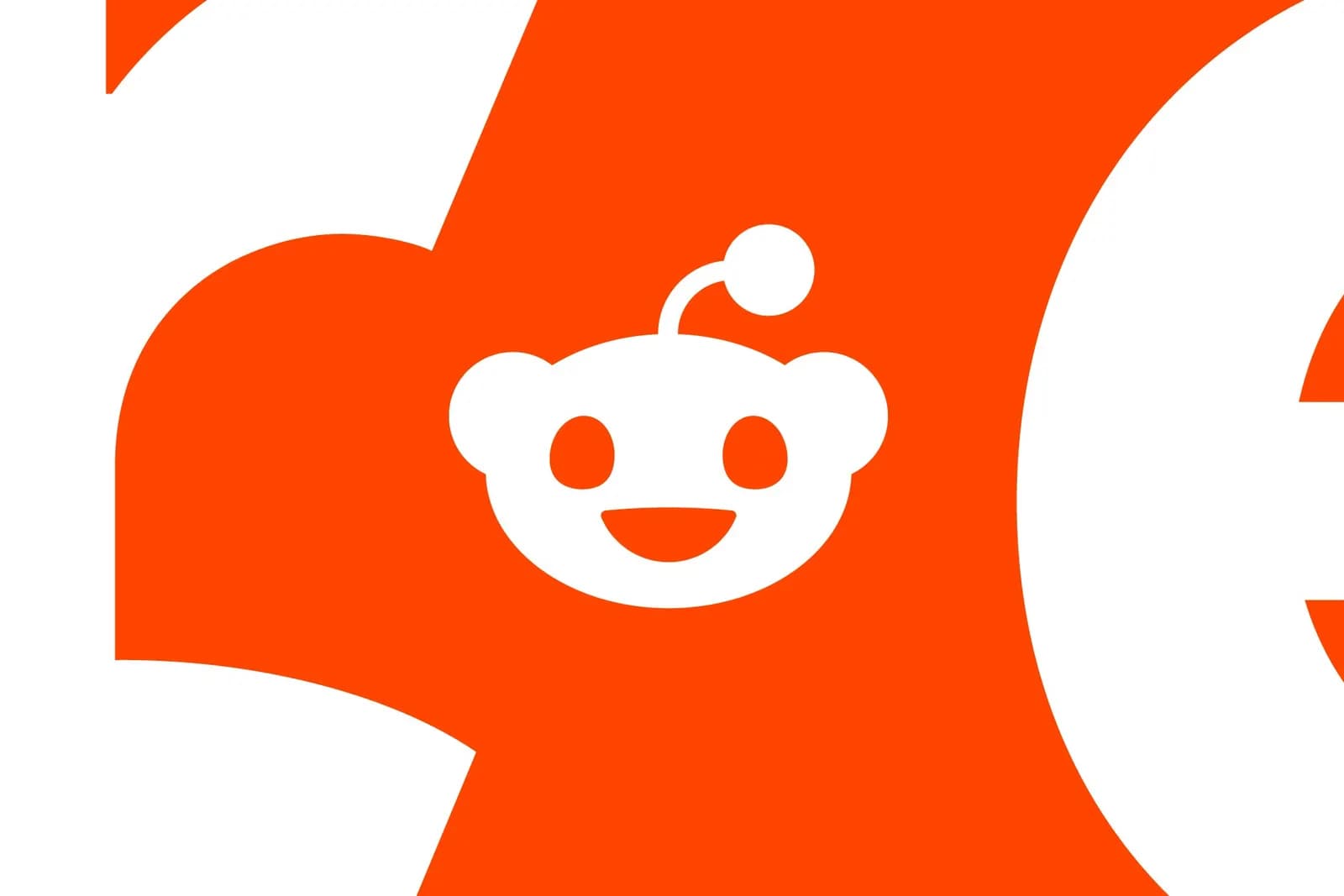 White logo of Reddit's smiling mascot Snoo on an orange and white background, with large letter fragments