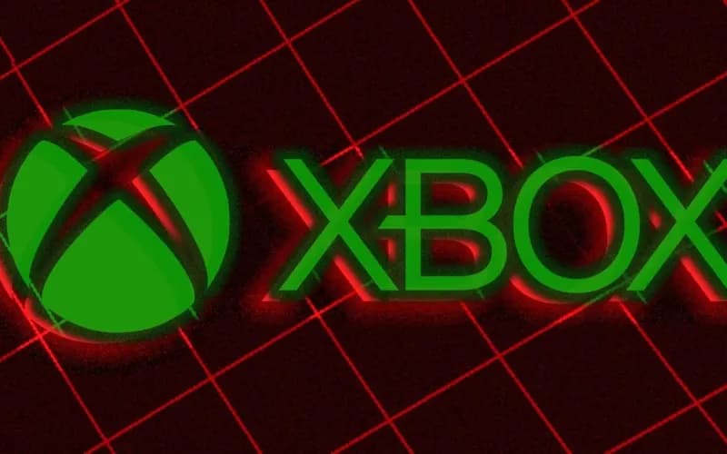 Glowing green Xbox logo and text on a dark red grid-patterned background