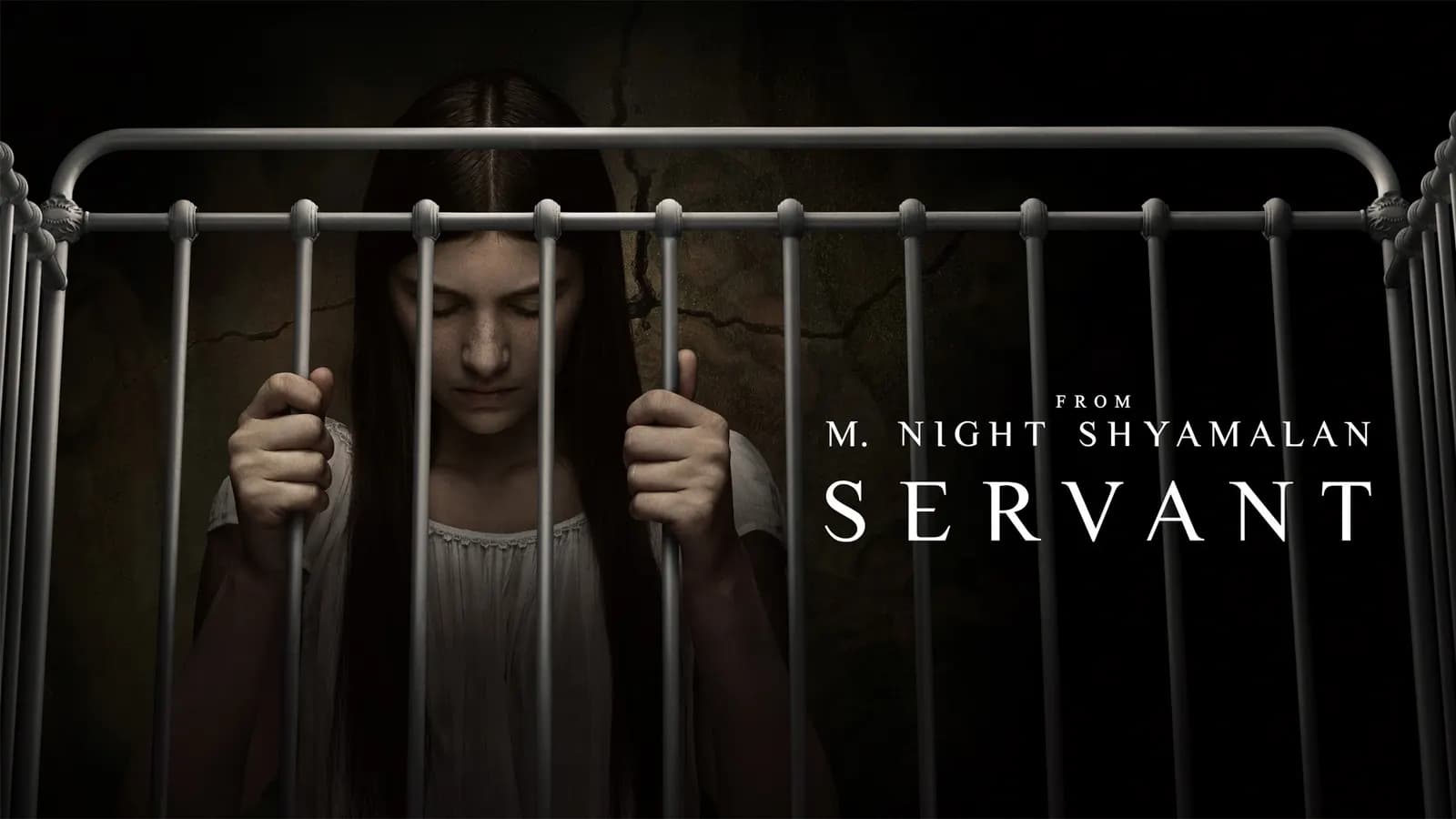 Young woman with long hair, head bowed, gripping the rails of a crib, beside the title text for the series 'Servant'