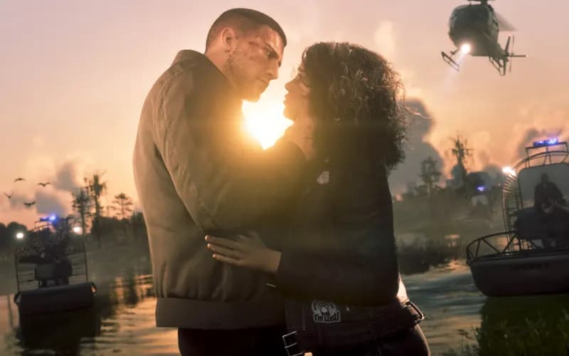 A couple embraces in a marsh at sunset, with police boats behind them and a helicopter overhead.