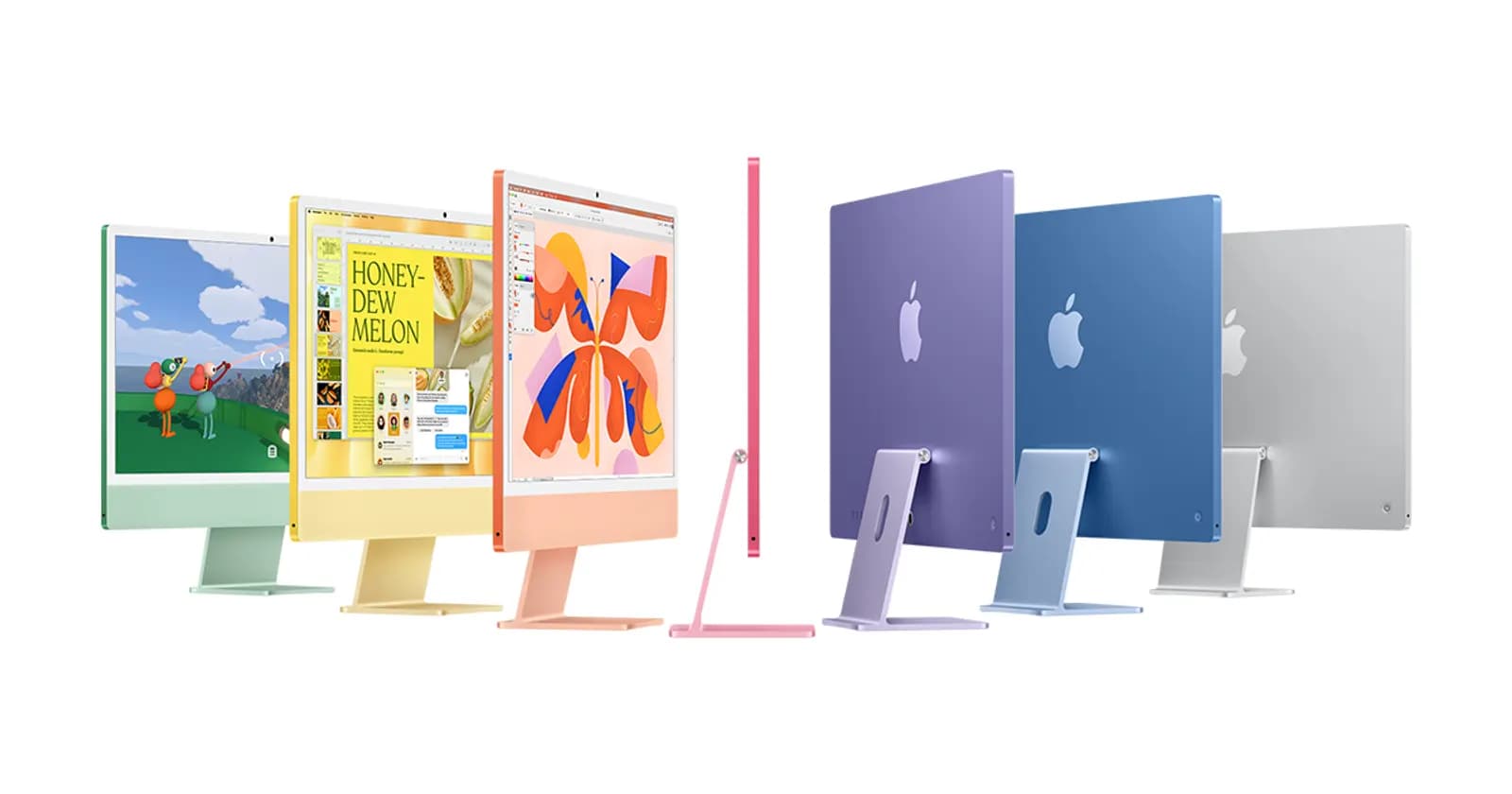 Yeşil, sarı, turuncu, pembe, mor, mavi ve gümüş renklerde yan yana dizilmiş renkli iMac bilgisayarlar